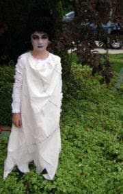 Teen Bride of Frankenstein costume featuring a ghostly layered dress and iconic wig for Halloween.