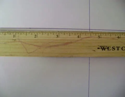 ruler measuring on back of container