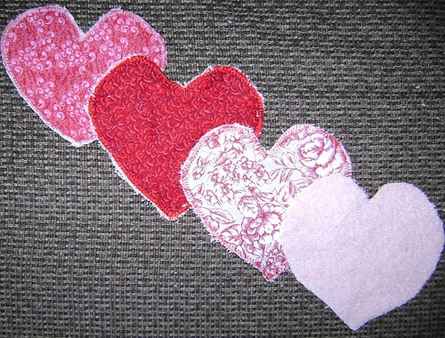 terry cloth cut into heart shapes and stitched using blanket stitch