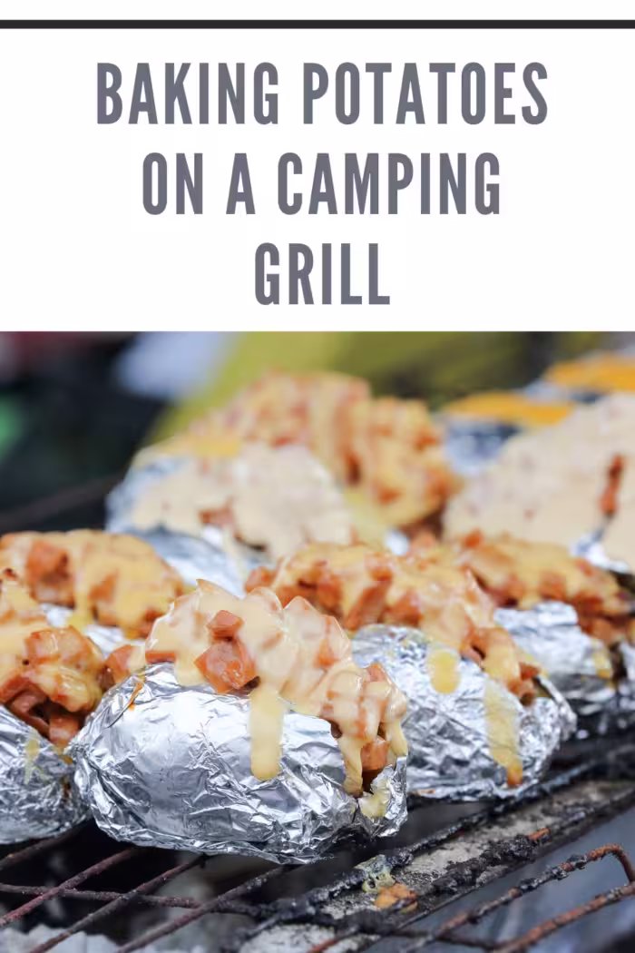Baked potato cooked on a camping grill and ready to serve as an easy outdoor side dish