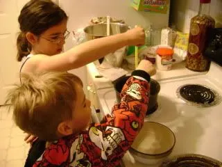 Li'l Man added the soaked seaweed to Abi's powdered seaweed mixture