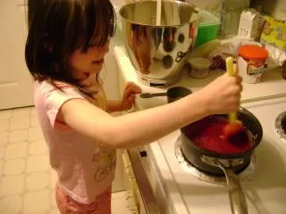 adding the colored sugar