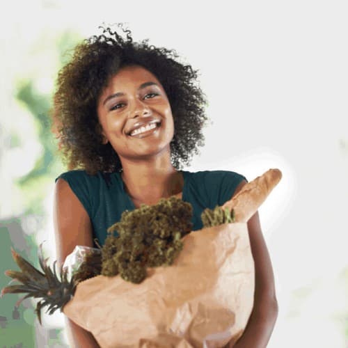 young woman carrying a grocery to make favorite foods healthier.