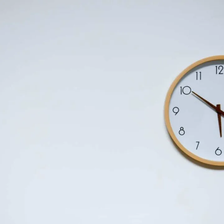 learning to tell time with wall clocks