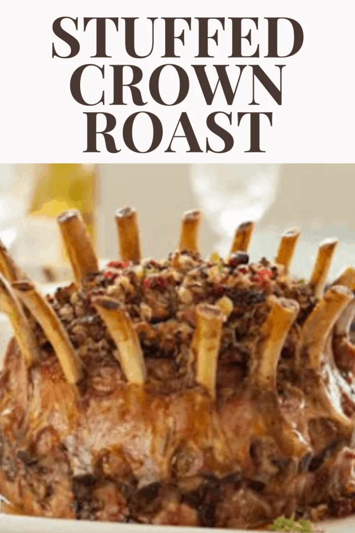 Stuffed crown roast with apricot glaze and sausage stuffing, perfect for festive dinners