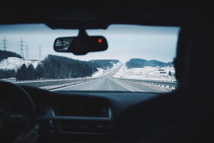 looking at road in winter through windshield