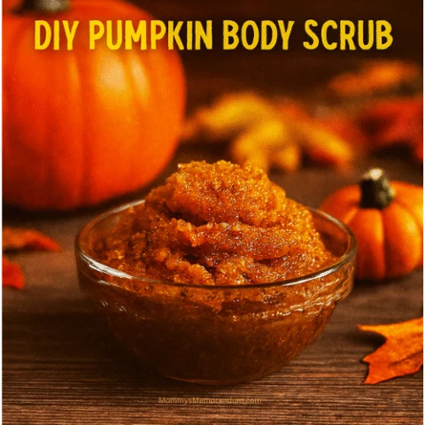 A bowl of DIY pumpkin body scrub with a coarse, orange-brown texture sits on a rustic wooden surface surrounded by autumn leaves and small pumpkins. The text overlay reads &ldquo;Glow Big or Gourd Home&rdquo; with a subtitle &ldquo;DIY Pumpkin Body Scrub.&rdquo; The warm lighting and fall-themed props evoke a cozy, seasonal spa vibe.