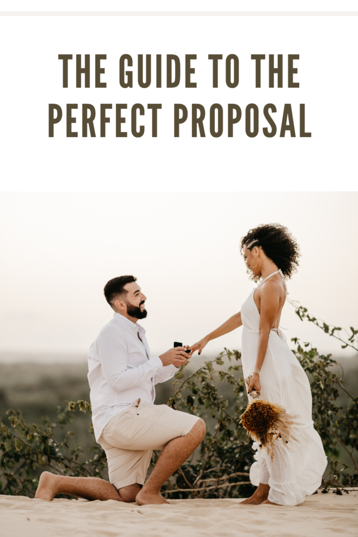 man kneeling proposing with ring
