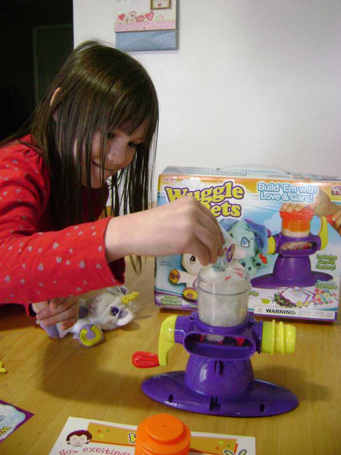 Adding the fluff and magic dust to the stuffing machine wuggle pet review