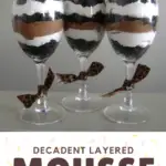 This decadent layered mousse recipe is easy and will have your guests raving about it. It's layers of Oreo, white chocolate, and dark chocolate so every spoonful is decadence!