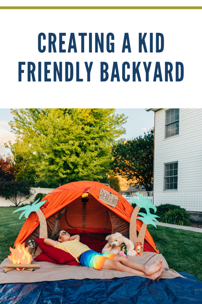 kid with tent pretending its a beach