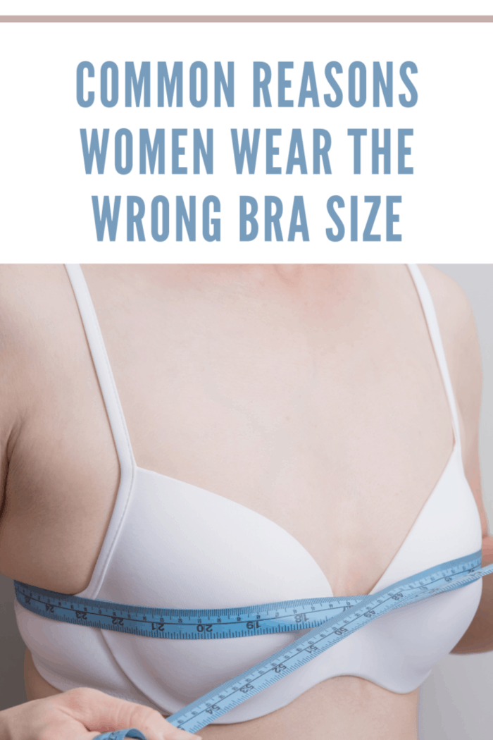 Woman with small underwear bra cup and measurement tape