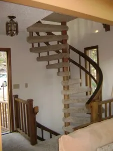 The floors of the Hytta are connected by a spiral staircase