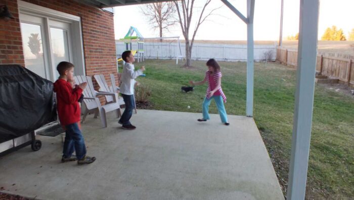 Kids playing with vibrant Borax bouncy balls, showcasing a fun and engaging DIY craft project