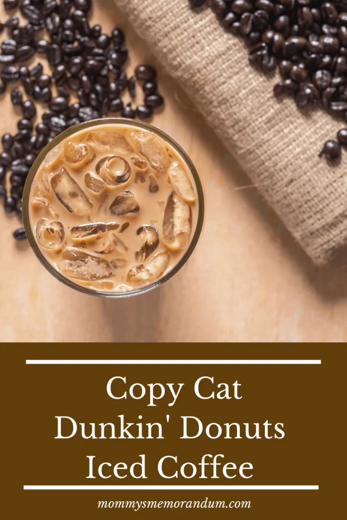 overhead view of copy cat dunkin coffee on table next to roasted coffee beans