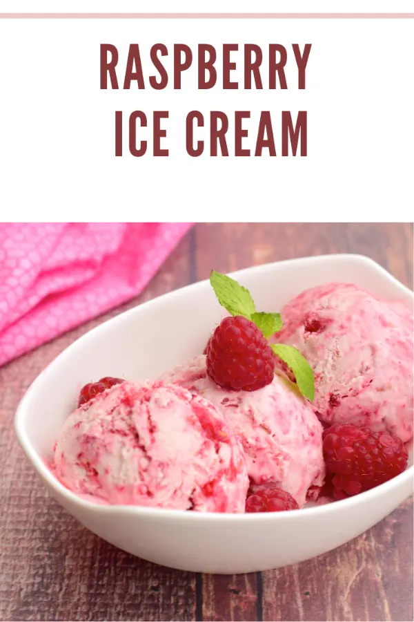 Delicious homemade raspberry ice cream topped with fresh raspberries and served in a bowl