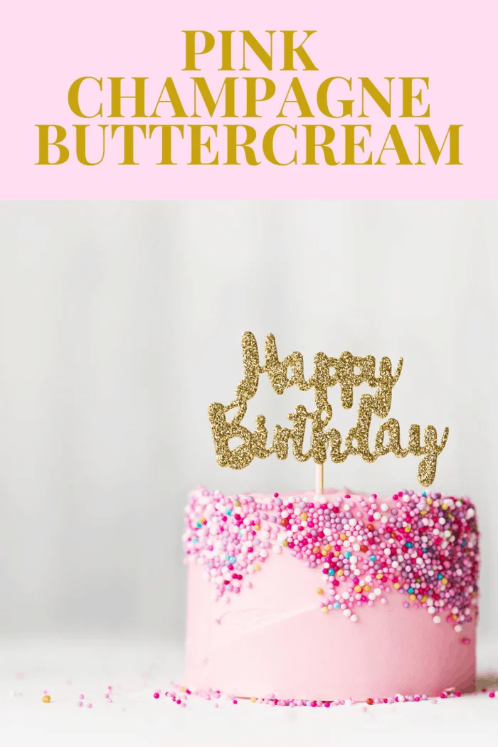 pink champagne bruttercream iced Happy Birthday Cake with lots of pink sprinkles
