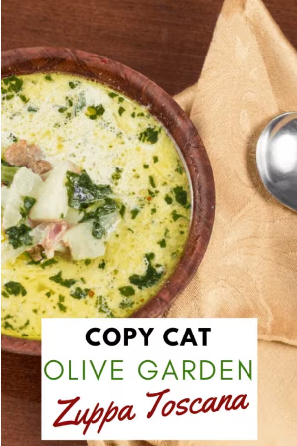 A bowl of easy Zuppa Toscana with sausage, kale, and potatoes, rich in flavor, just like Olive Garden's recipe.