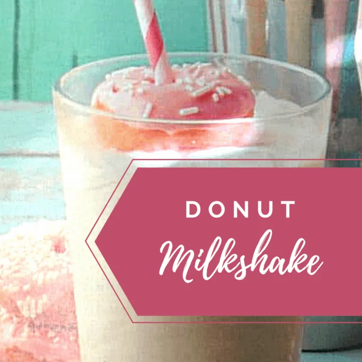 Donut milkshake against soft teal background