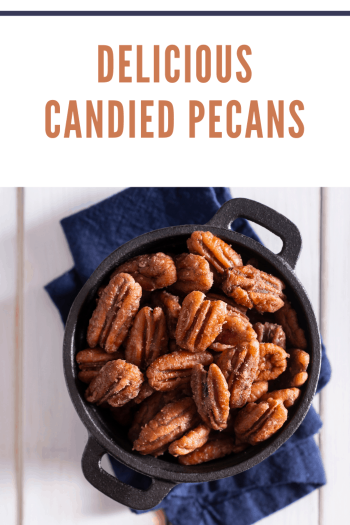 aerial view of candied pecans in black bowl