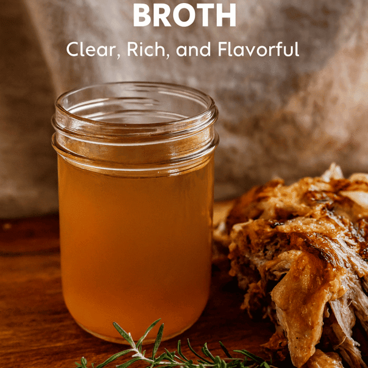 Clear roasted turkey broth in a mason jar with herbs and turkey bones on a rustic wooden table, styled for Pinterest with cozy lighting and a cheeky tagline overlay.