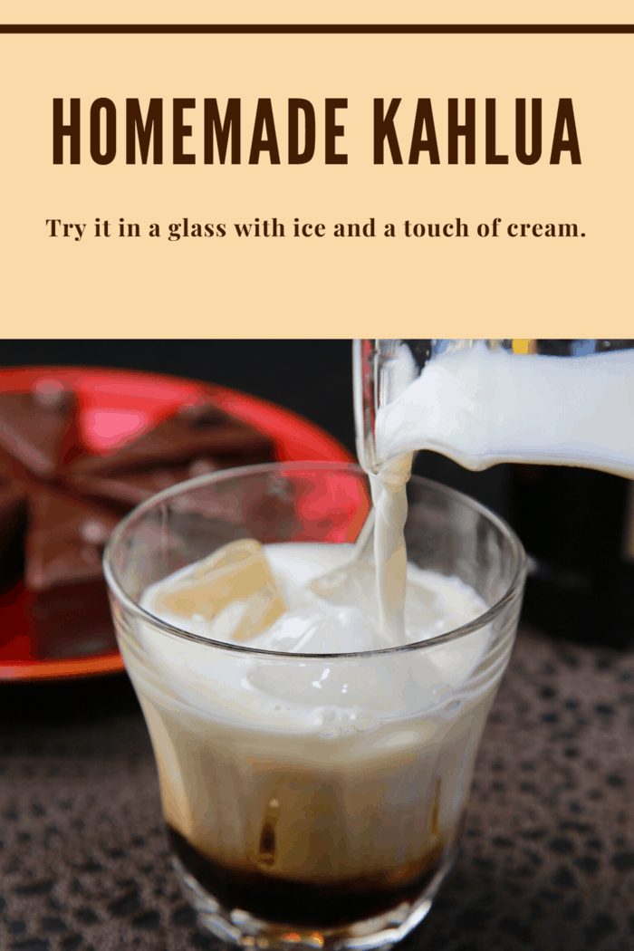 Cream poured into a glass over homemade Kahlua, showcasing an easy, affordable way to make Kahlua at home