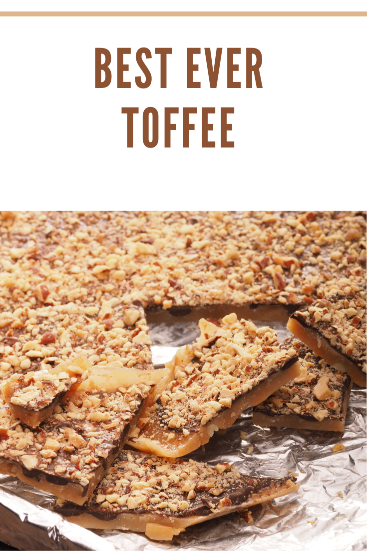 toffee on a baking sheet with corner pieces broken