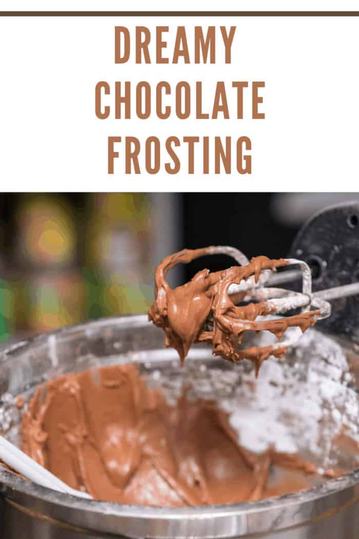 Mixing chocolate frosting in a bowl for a cake