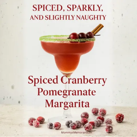 A festive margarita in a sugar-rimmed glass garnished with cranberries and a cinnamon stick, surrounded by sugared cranberries. Text overlay reads &ldquo;Spiced, Sparkly, and Slightly Naughty&rdquo; with subtitle &ldquo;Spiced Cranberry Pomegranate Margarita.&rdquo; Holiday-themed cocktail image with warm lighting and cozy seasonal vibes.