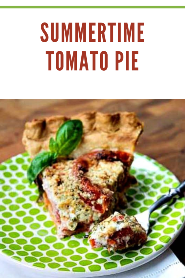 Delicious homemade tomato pie with a flaky crust, fresh tomatoes, and basil, ideal for summer meals.