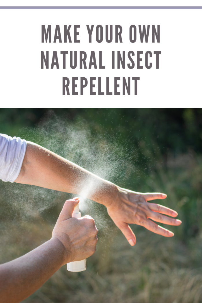 woman spraying natural insect repellent