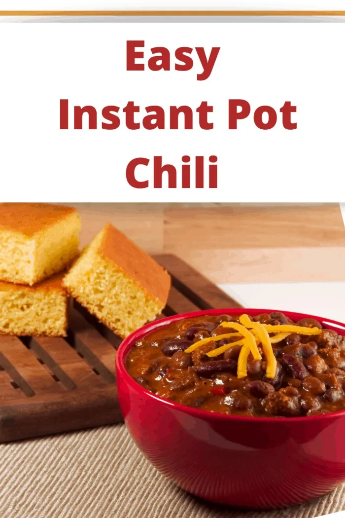 Classic combination of spicy chili with beans and homemade cornbread. Shallow DOF.