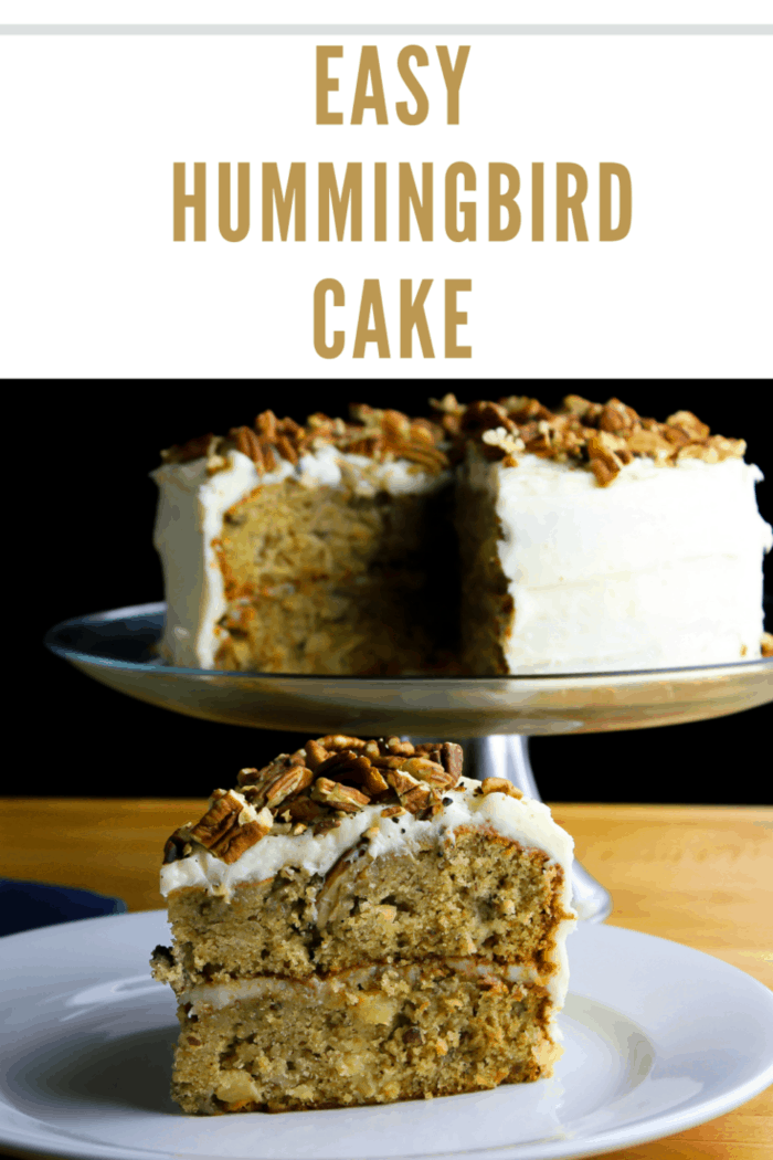 A slice of homemade two-layered hummingbird cake with a cup of coffee