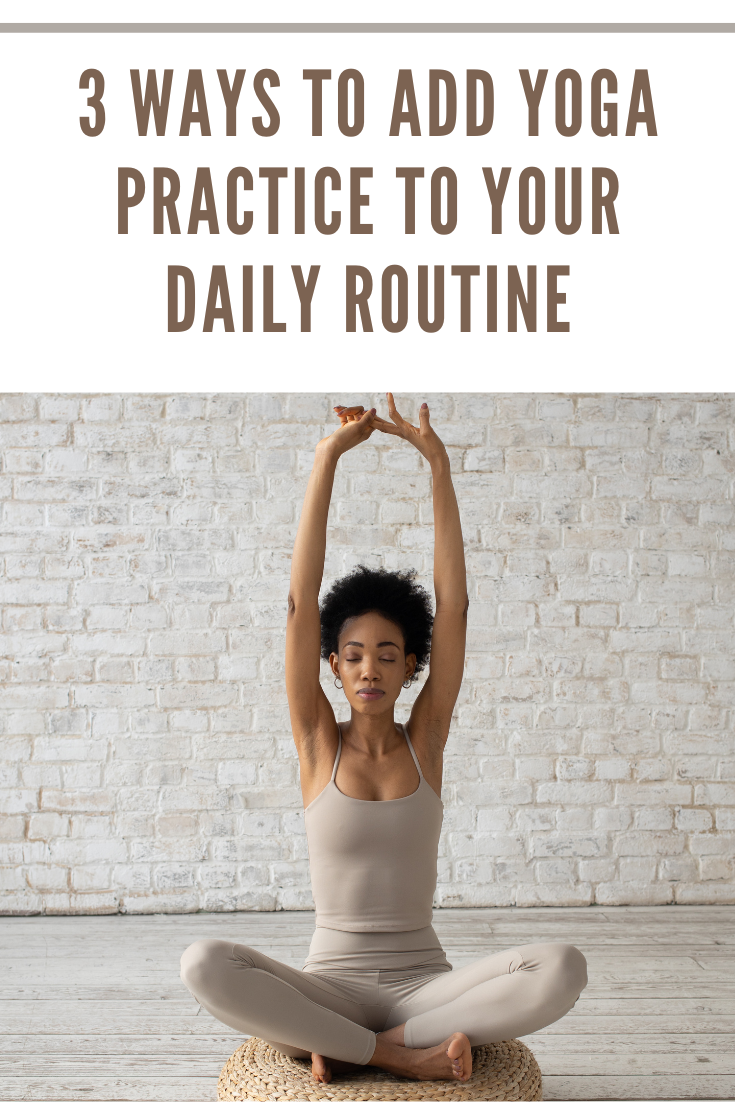 woman doing yoga with arms up