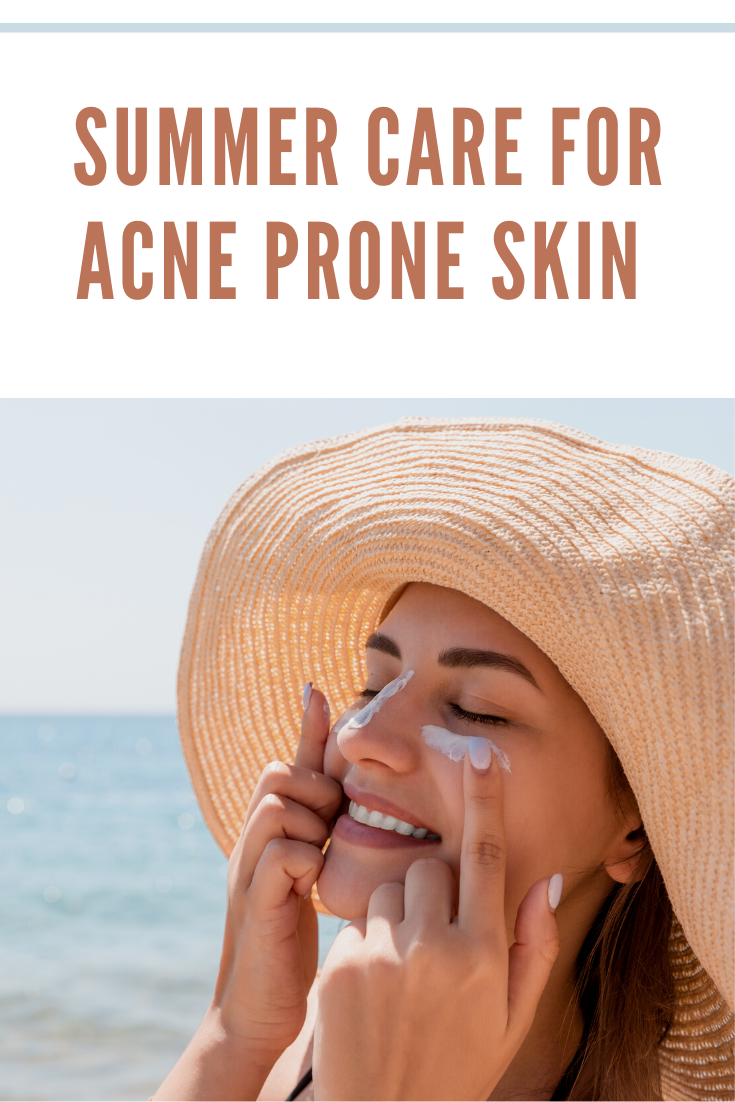 Smiling Woman in Hat Is Applying Sunscreen on Her Face