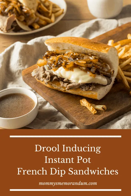 Finished Instant Pot French Dip Sandwich with melted cheese and au jus