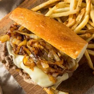 The Best Instant Pot French Dip Sandwiches are waiting. Tender, juicy meat topped with ooey-gooey cheese and nestled inside a toasted grinder. Dip in the homemade au jous for an incredible drool-worthy meal