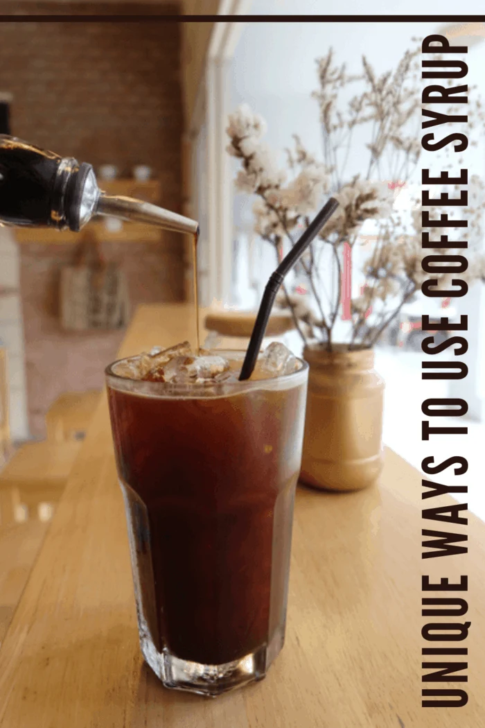 iced coffee with coffee syrup being added