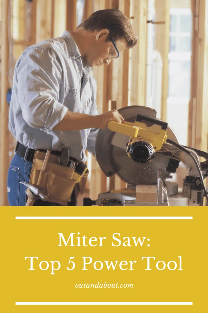man using jig saw in workshop
