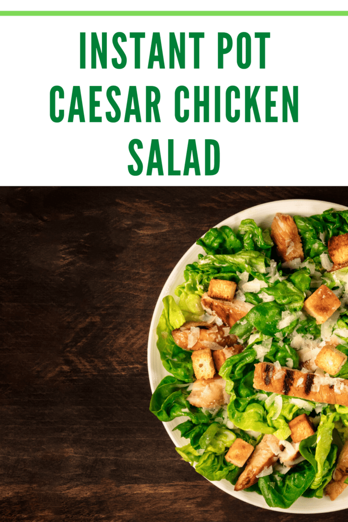 instant pot chicken caesar salad on plate with chicken cubed
