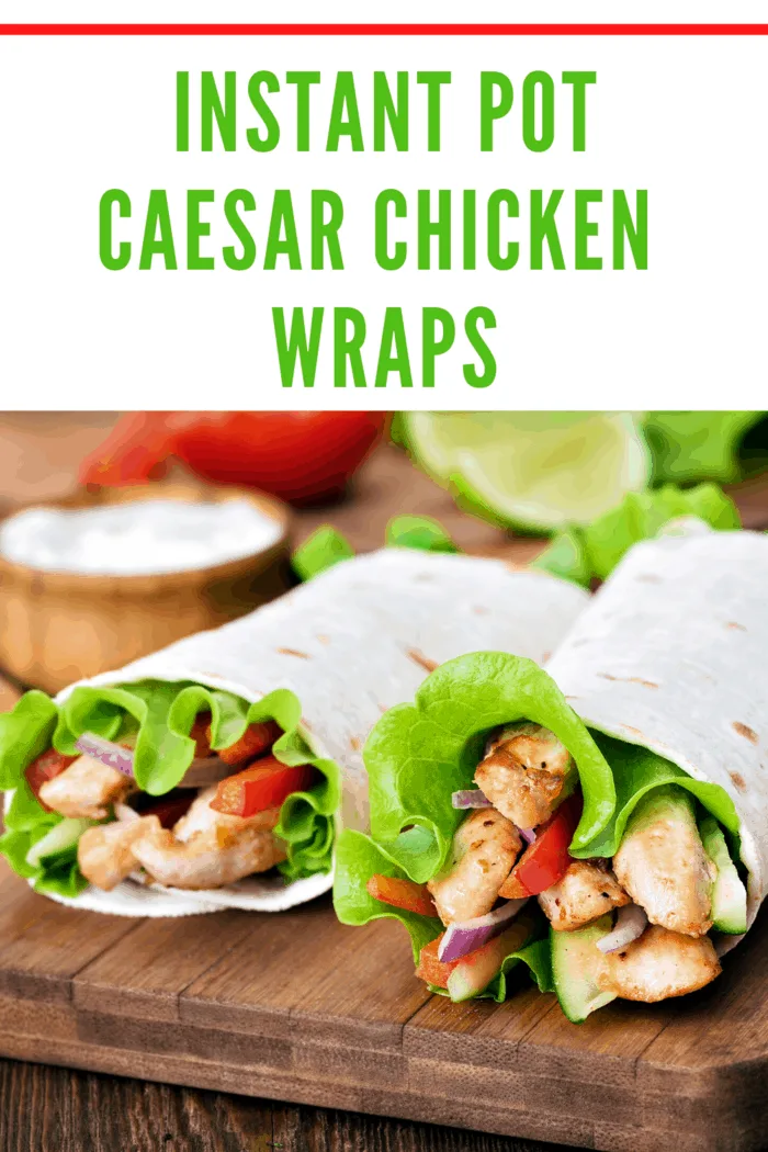 two instant pot caesar chicken wraps on cutting board