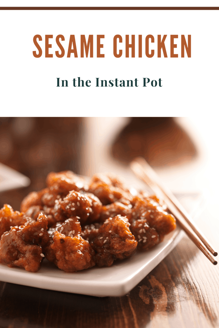 instant pot sesame chicken on plate with chopsticks
