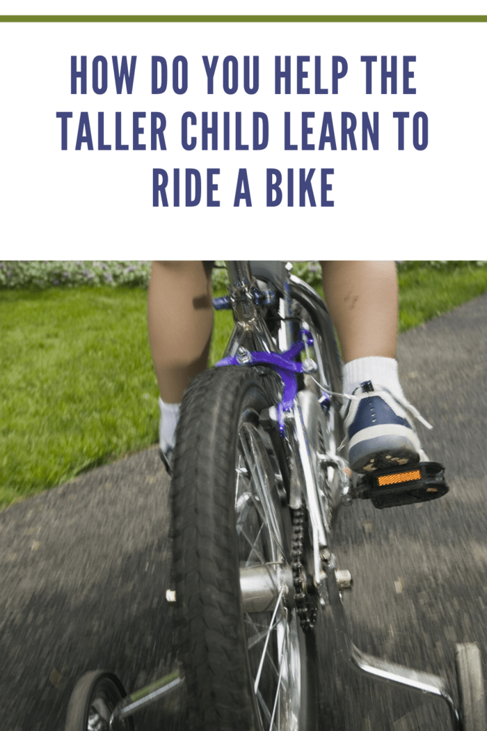 riding a bike with training wheels
