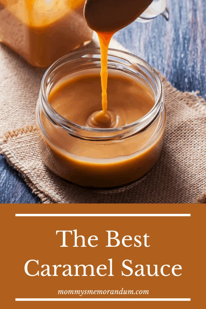 A spoon drizzles smooth homemade caramel sauce into a jar, ideal for topping desserts, ice cream, and more.