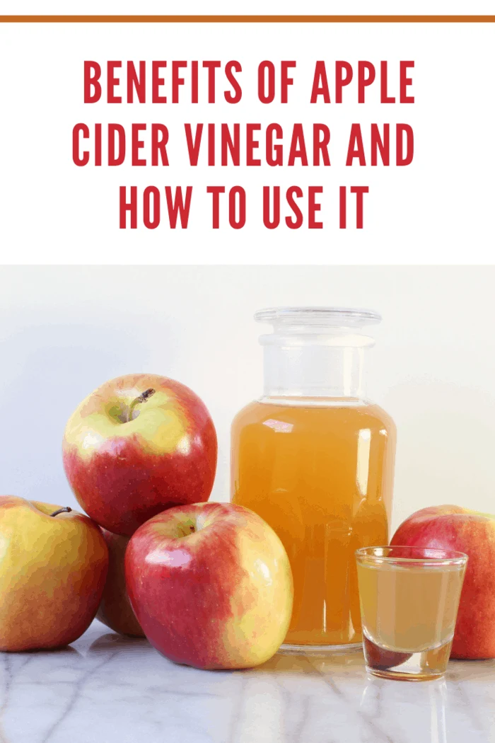 Apple cider vinegar and apples. Copy space.
