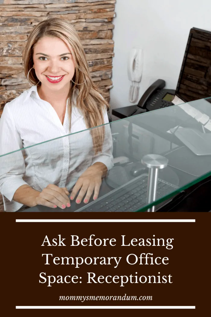 receptionist with smile at temporary office space leasing building