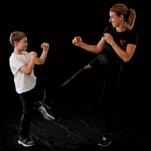 mother and son kickboxing