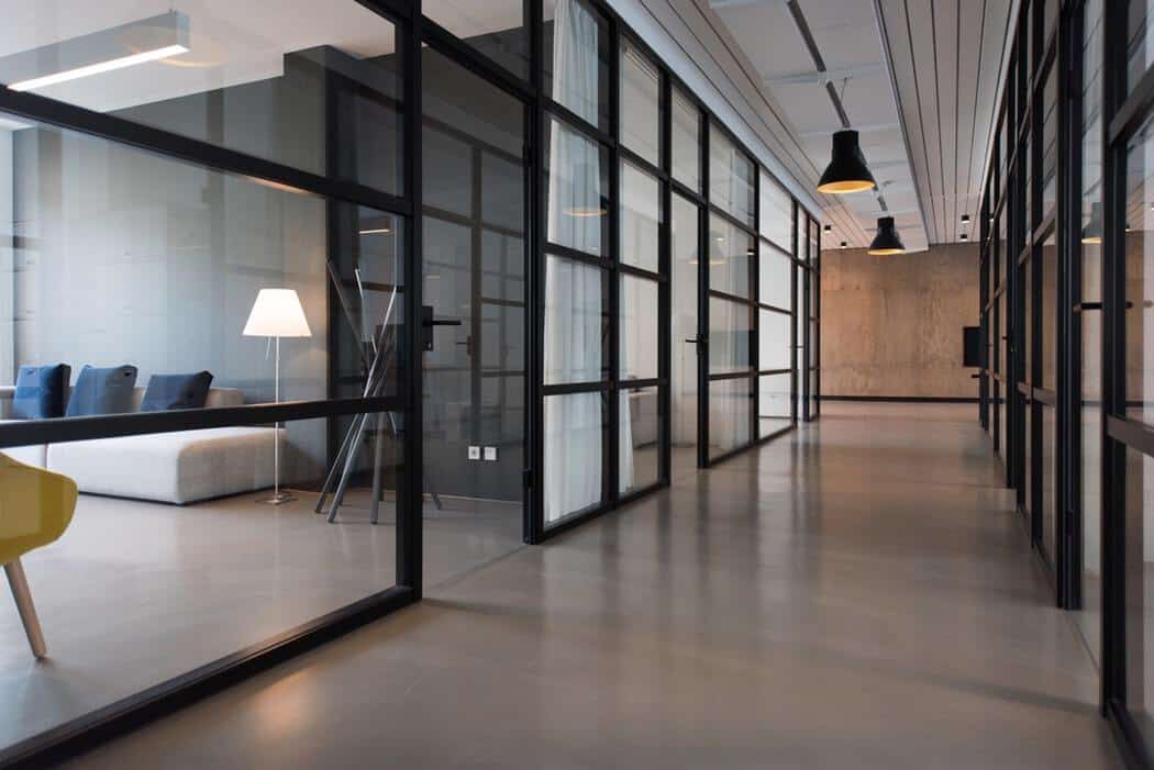 office space with glass partitions