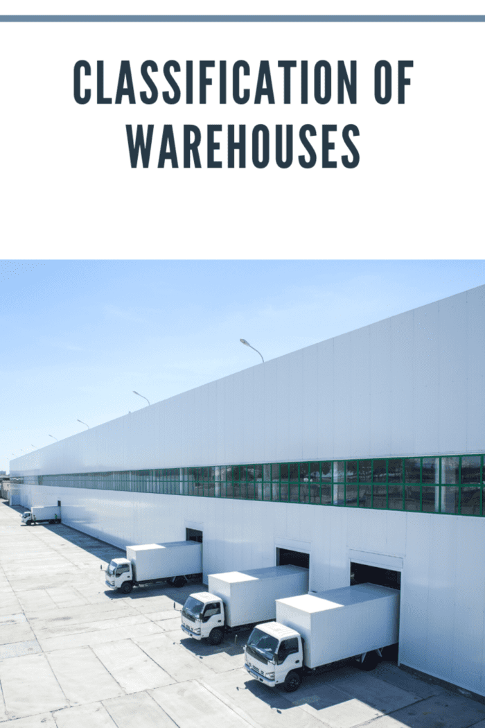 facade of an industrial building and warehouse with freight cars in length