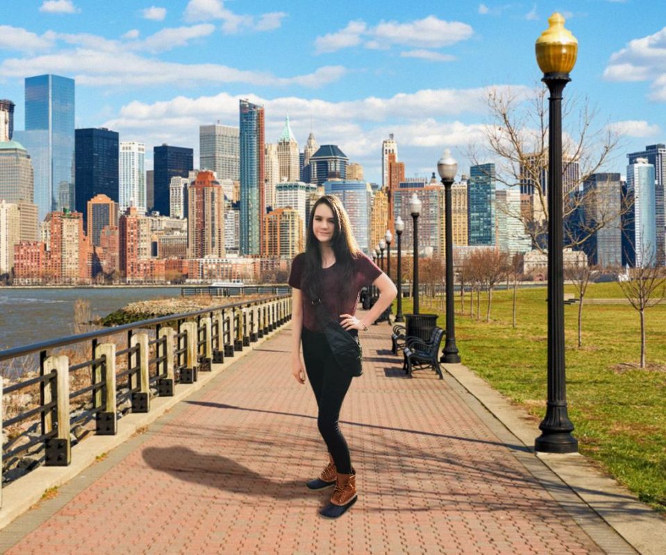 sash bag with city skyline behind